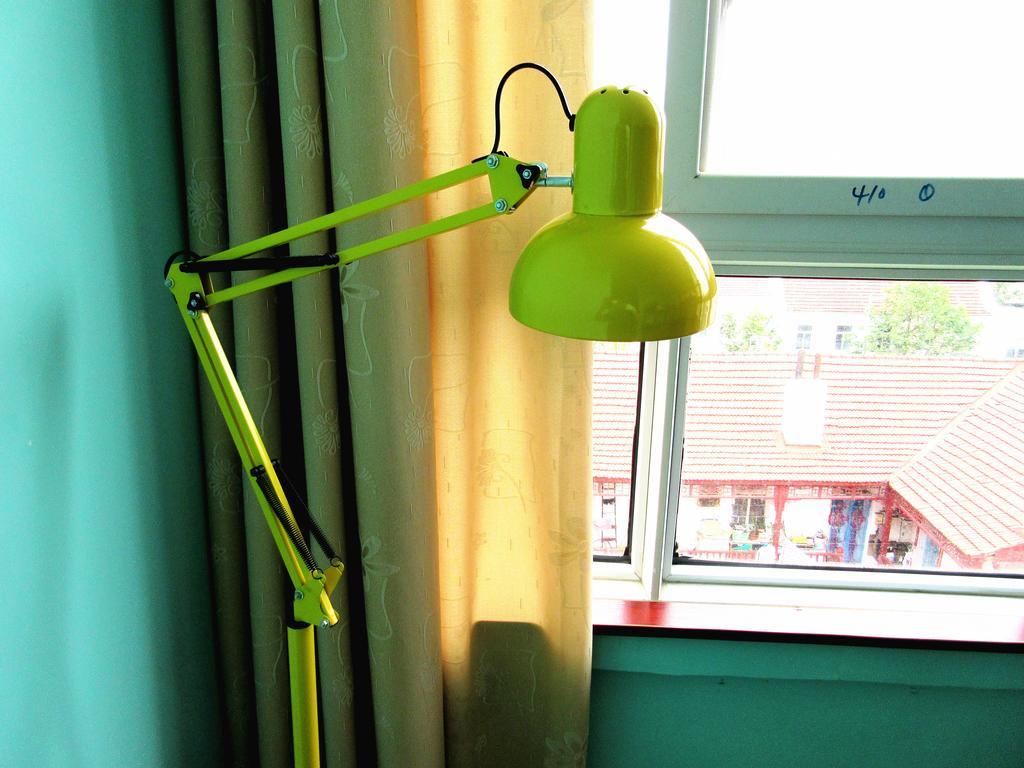 25°C Four Season Youth Hostel Qingdao Habitación foto