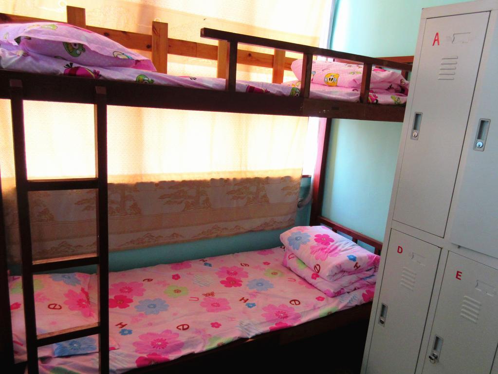 25°C Four Season Youth Hostel Qingdao Habitación foto